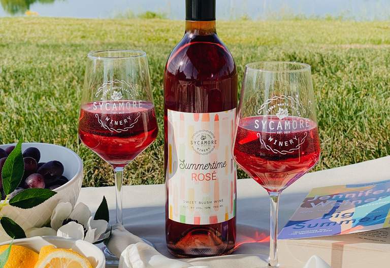 A bottle of wine and two glasses at Sycamore Winery in Terre Haute, Indiana