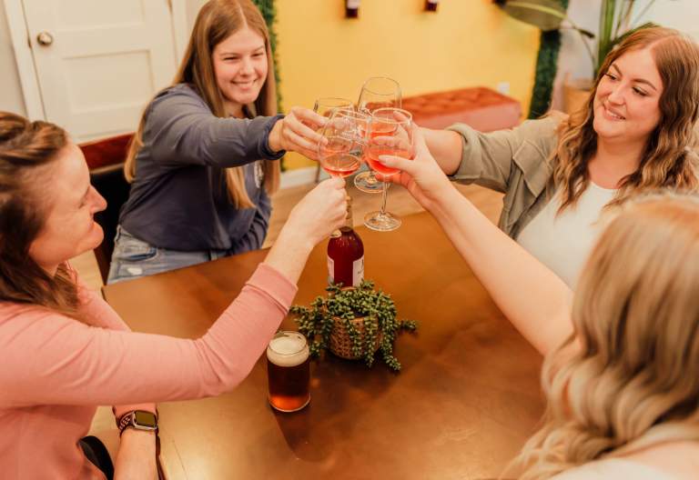 Friends drinking wine at WaterTower Winery