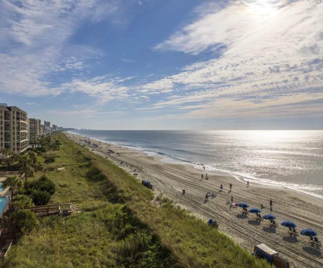 North Myrtle Beach Shoreline, with an oceanfront resort, early in the morning.