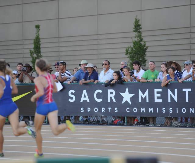 Sacramento Sports Commission sign at a track meet