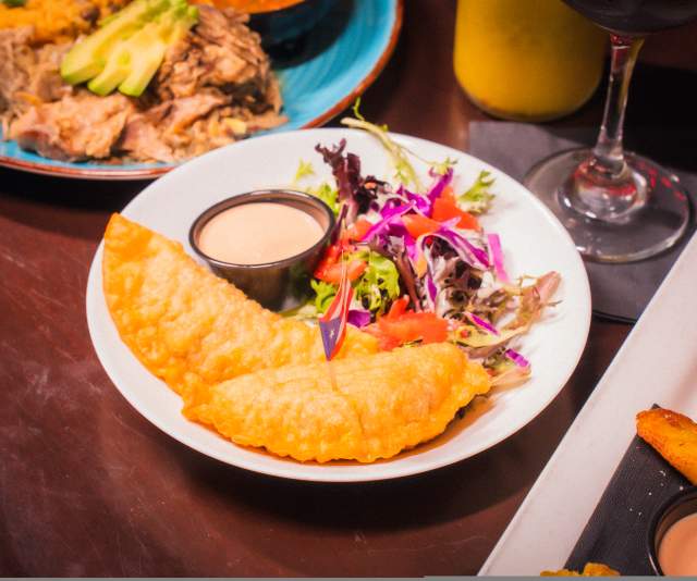 A spread of dishes at Lola's Lounge, first Puerto Rican restaurant in Sacramento