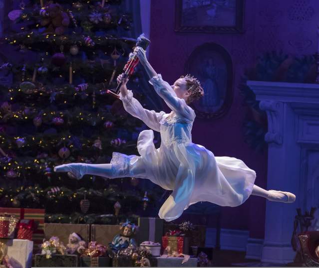 A Ballerina on Stage Dancing the Nutcracker.