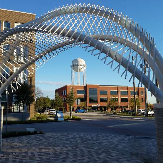 McKinney Park Structure framing historic downtown water tower