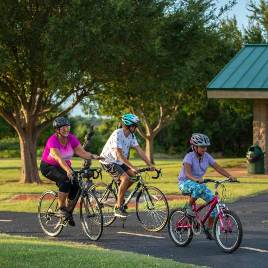Family of 3 cycling