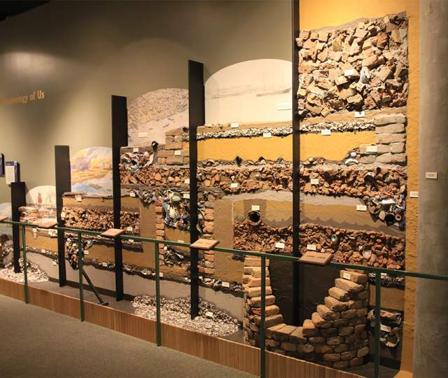 An exhibit showing layers of earth from an archaeological dig.
