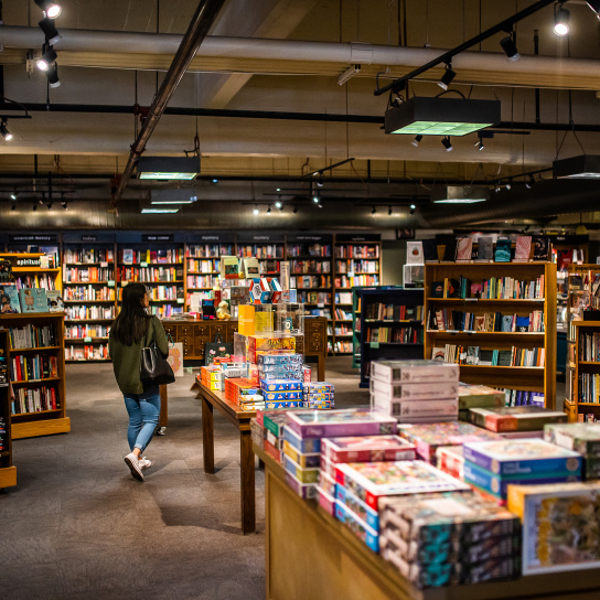 rows of shelves and tables of books