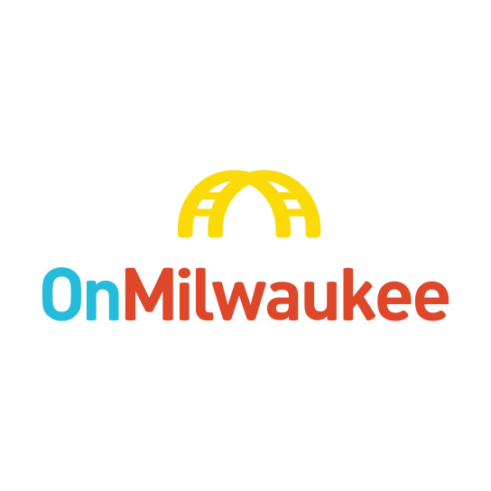 A golden arch symbolizing the Hoan Bridge in Milwaukee above text that reads "OnMilwaukee" with the "On" being in blue and the "Milwaukee" being in red, against a white background.