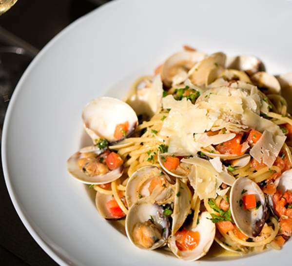 Seafood pasta with clams is a popular menu item at Beach House restaurant on Jekyll Island, Georgia