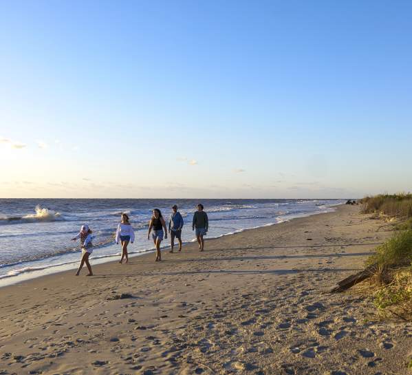 Family Walking on the Beach