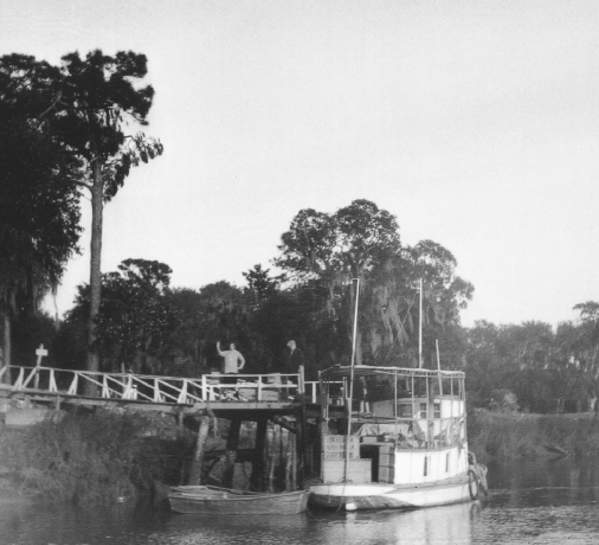 Guests arrive by boat at the historic dock on Little St. Simons Island, Georgia