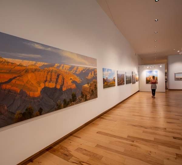 Exhibit at the Southern Utah Museum of Art in Cedar City showcasing the vibrant desert landscapes of Utah.
