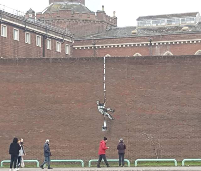 Banksy artwork on the wall of Reading Prison