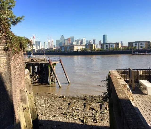 View of the shore at Deptford and across to Canary Wharf