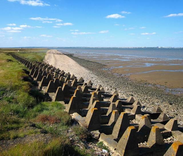 Military defence items on the shore at Grain
