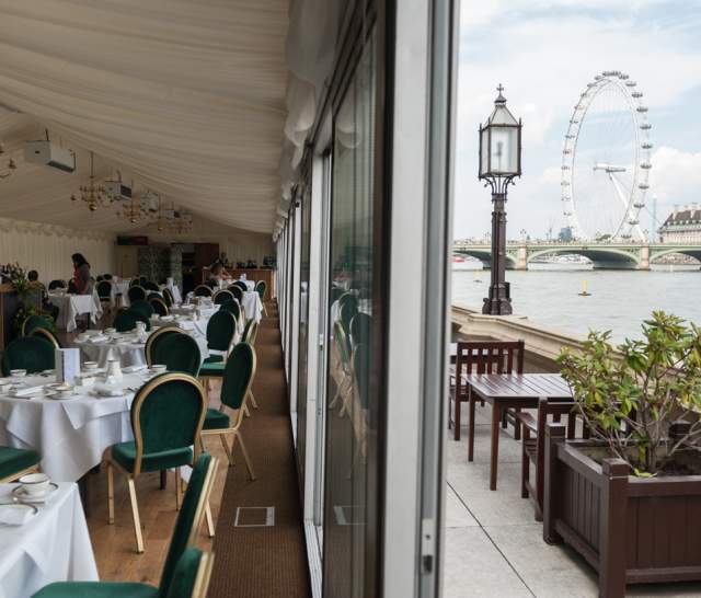 View of London Eye from terrace of the Palace of Westminster.