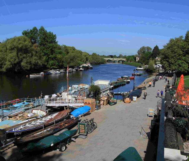 Thames Path by the river at Richmond with sign for Bike Hire