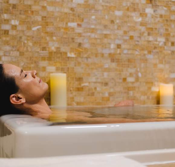Women in spa bath relaxing