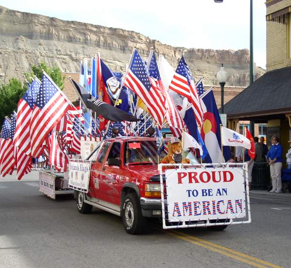 Proud to be an American Truck with US and CO flags