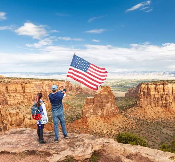 Dillon and Teagan at Colorado National Monument with America Flag