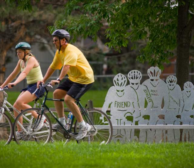 People Riding Bikes Through Omaha Park