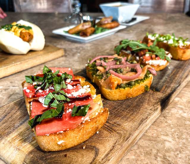 Food dishes from Nosh Restaurant and Lounge.