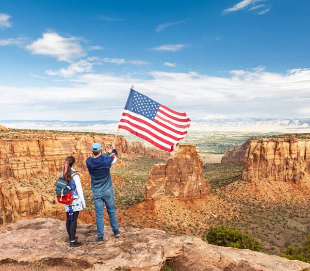Dillon and Teagan at Colorado National Monument with America Flag