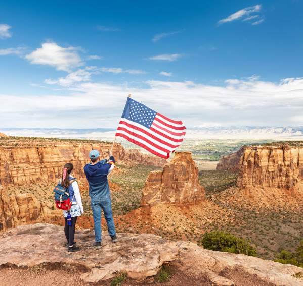 Dillon and Teagan at Colorado National Monument with America Flag