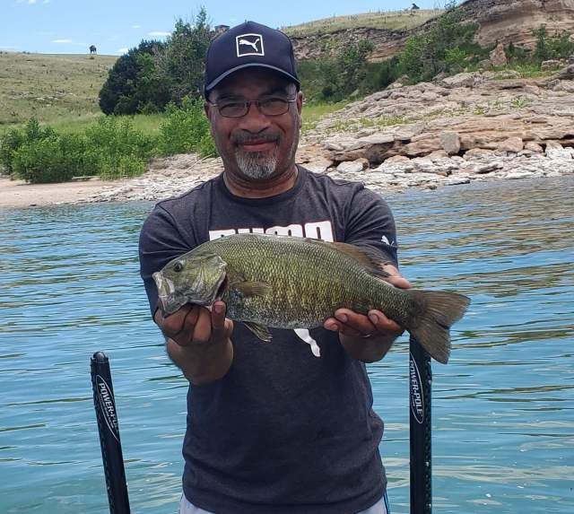 Man Holding Bass