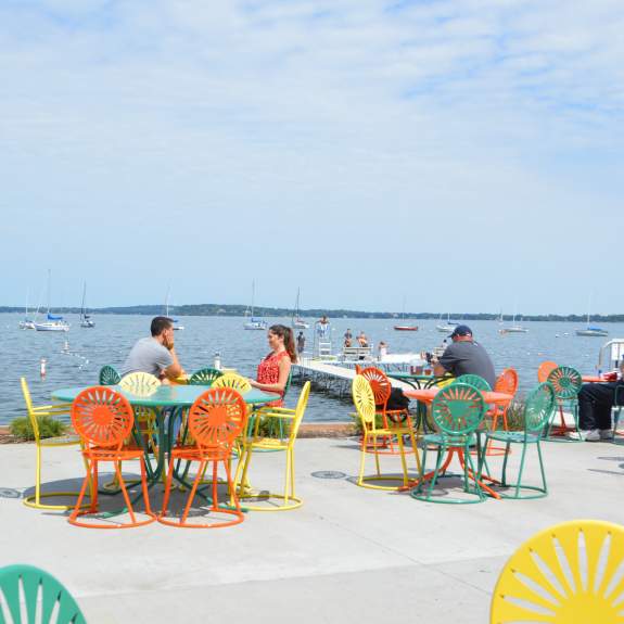 People enjoy Memorial Union Terrace on a sunny day