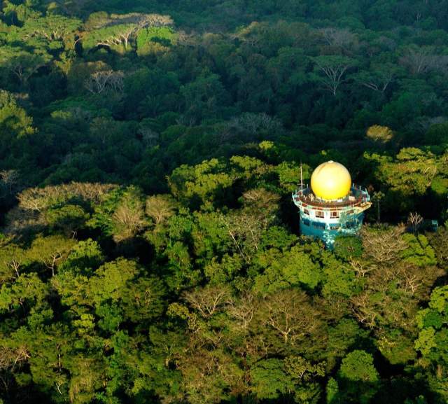 Aerial view of the Canopy Tower, a bird watching place surrounded by a lot of vegetation in Soberania National Park