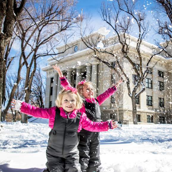 Kids Playing in the Snow at Yavapai County Courthouse