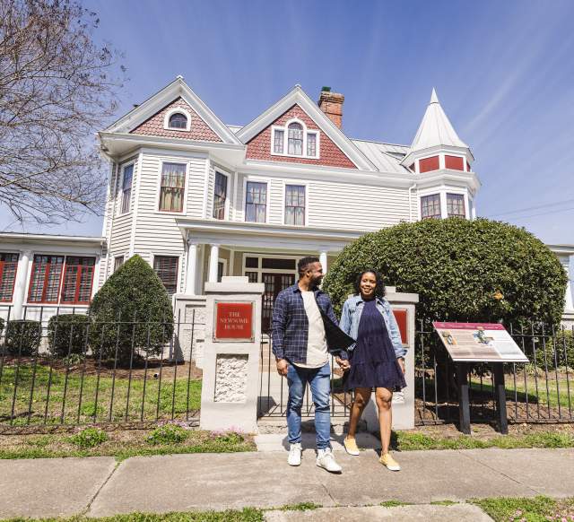 Couple outside the Newsome House