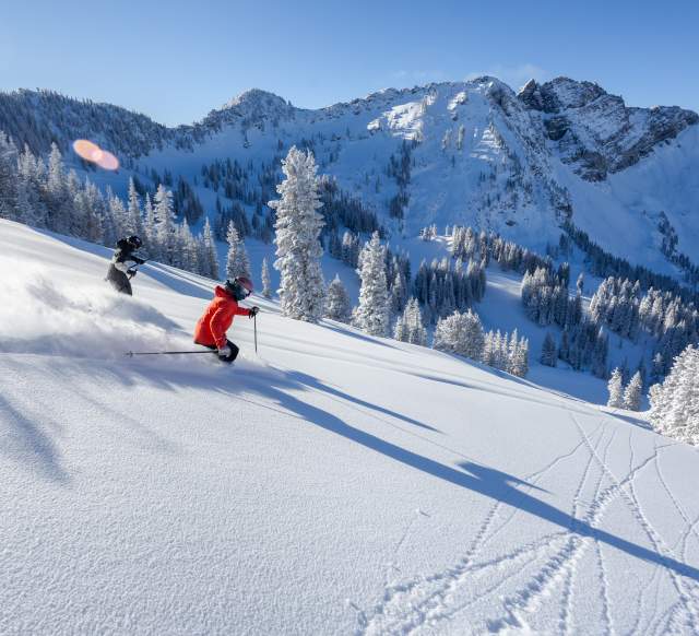 Skiers at Alta Ski Area in winter 2024