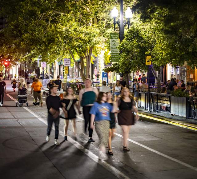 A group walking down Main Street during 2022’s Open Streets.