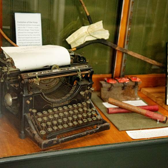 Vintage typewriter display inside the Red River Railroad Museum