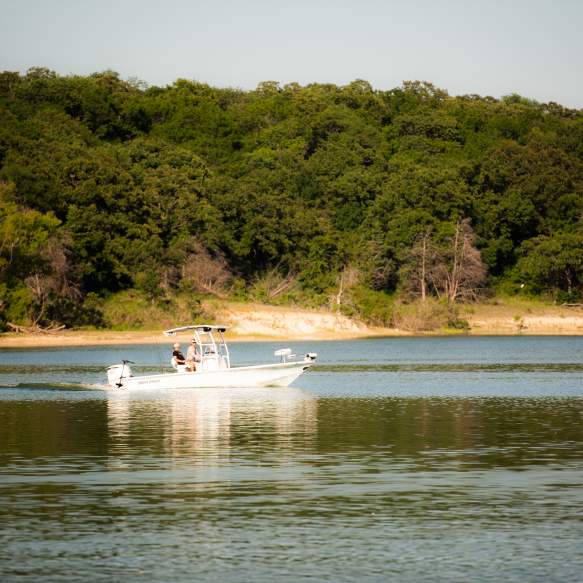 Two men on a fishing boat on Lake Texoma