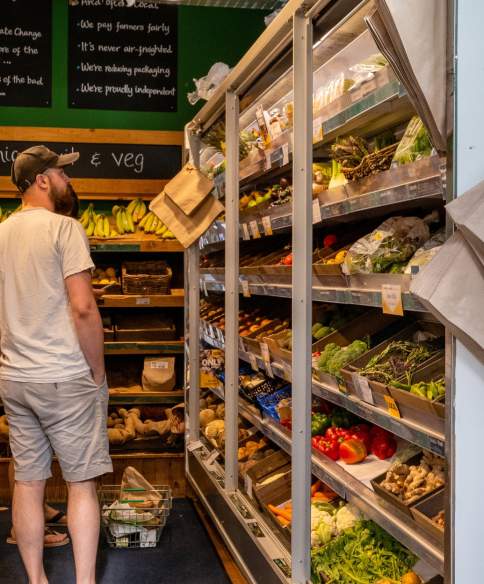 A man browsing the store at Better Food, Wapping Wharf on Bristol's Harbourside - credit Hey What