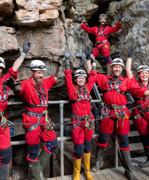 A group on the Wild Wookey caving experience in Wookey Hole - credit Wookey Hole
