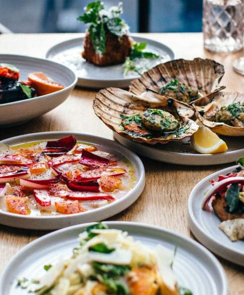Selection of small plates on a table at Bristol Lido
