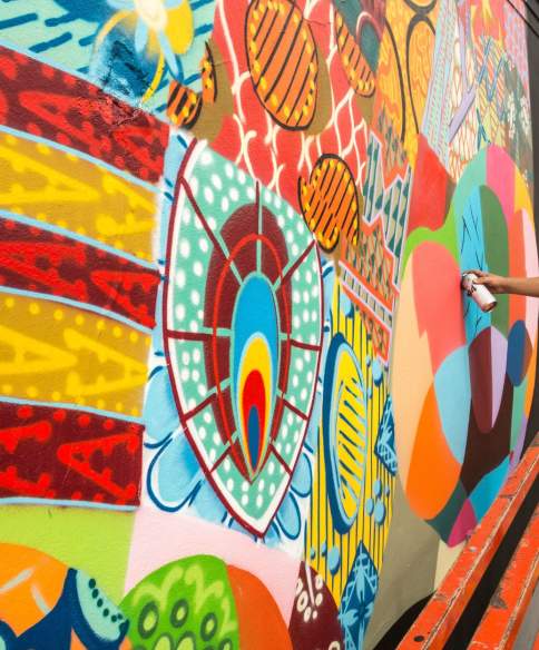 Louis Masai painting at Upfest 2016 in Bedminster, Bristol - Credit Plaster