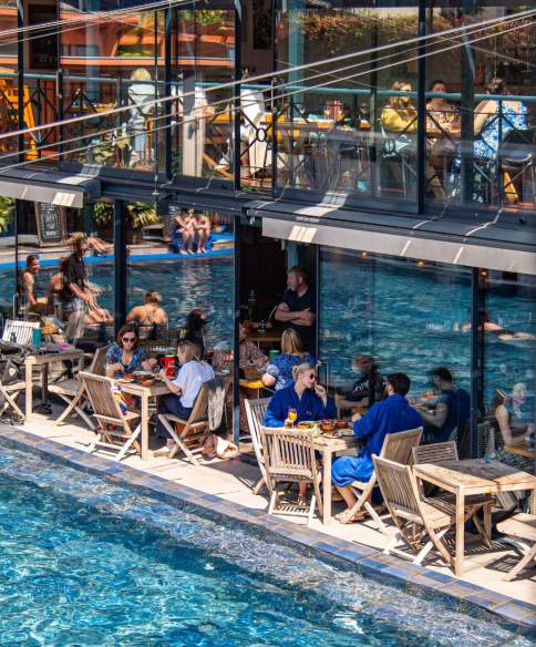 Bristol Lido people dining by pool