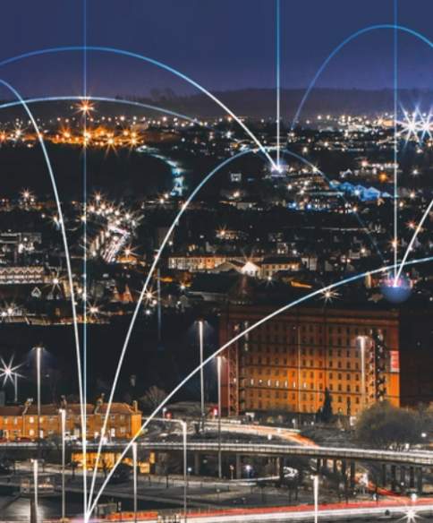 An ariel view of Bristol with lines of light connecting the buildings