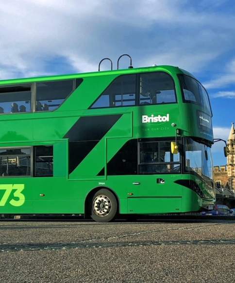 A green City Lines bus infront of Bristol Temple Meads - Credit First Bus