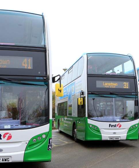 3 white and green First Bus buses for the Bath Park and Ride