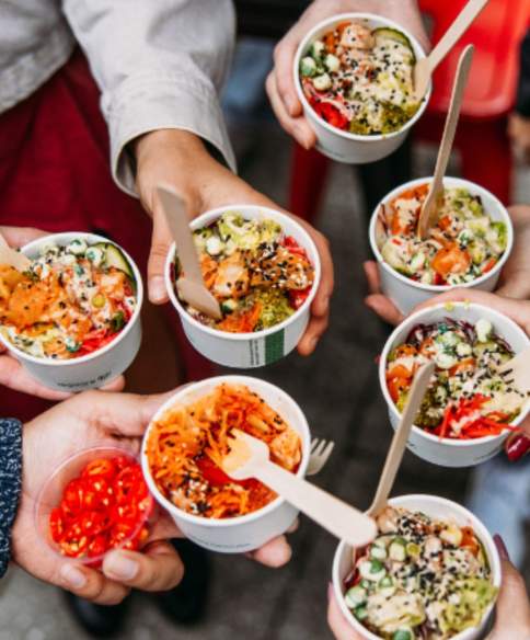 Group holding food samples - credit Food Tours of Bristol
