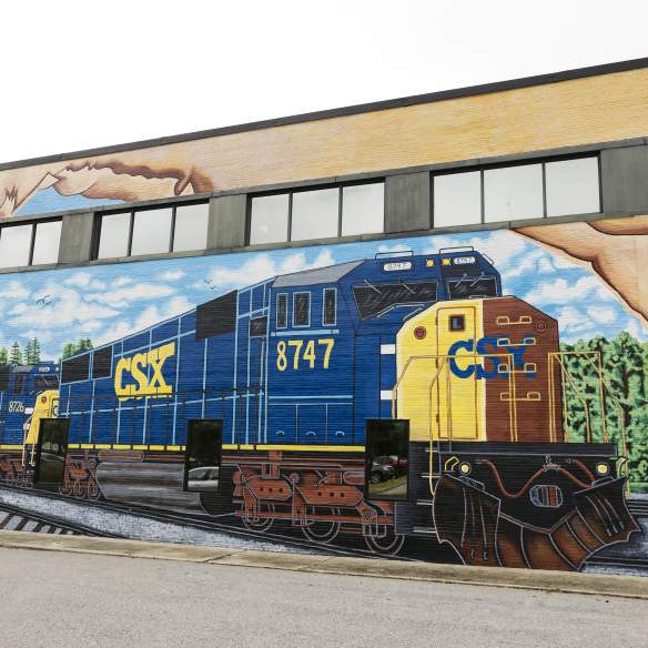 Colorful mural of a CSX train on a building in downtown Rocky Mount, North Carolina.
