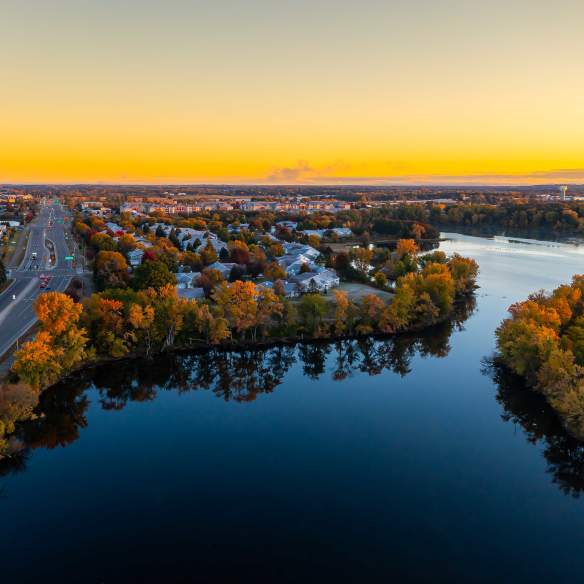 Aerial photo of a lake at sunrise