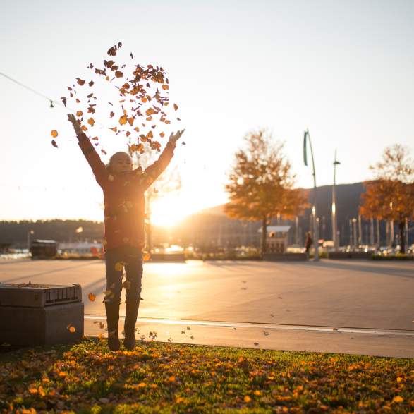 Girl Throwing Leaves - Stuart Park