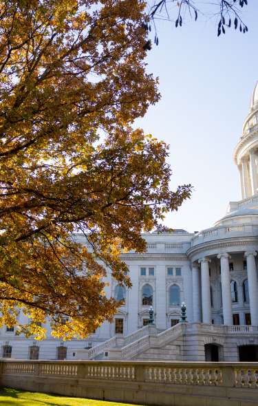 The Wisconsin State Capitol building in the fall.