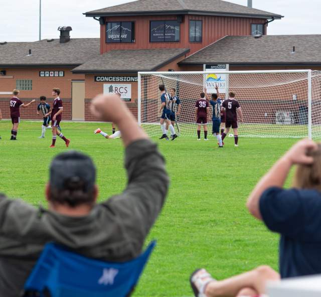 parents cheering on soccer players from the sidelines of Dakota Fields soccer complex in Rapid City, sd